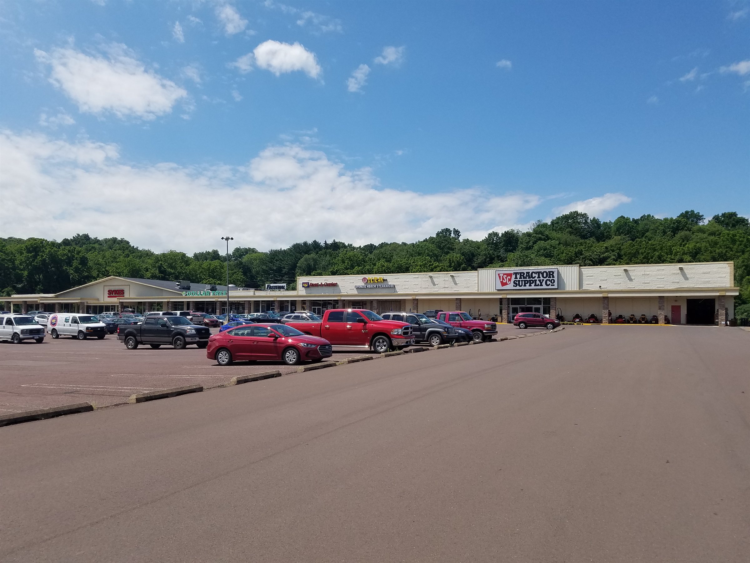 Scott Town Plaza storefronts and parking area in Bloomsburg